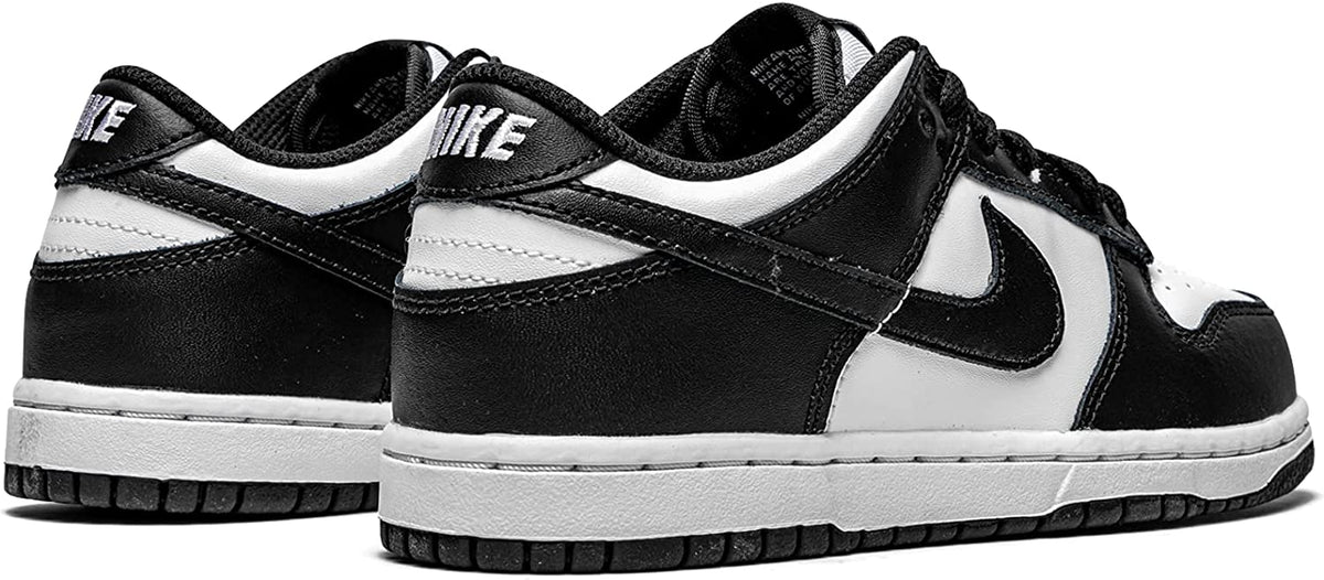Toddler's Nike Dunk Low sneakers pair view, white midsoles with black uppers and swoosh