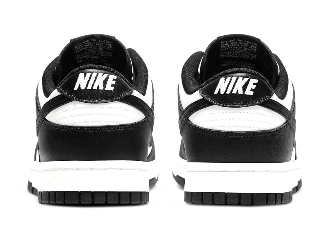 Black Nike Dunk Low sneakers, back view with NIKE heel text and white midsole