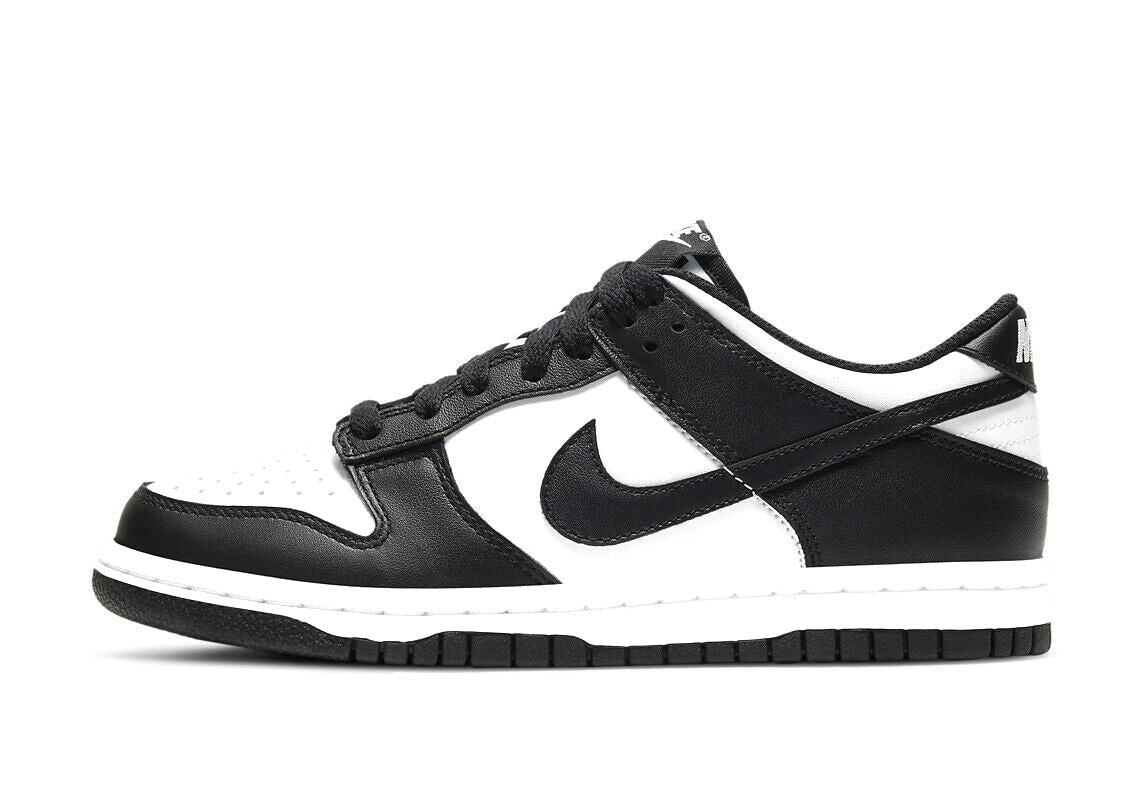 Black and white Nike Dunk Low sneakers, black Swoosh and lace-up front