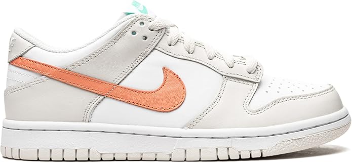 Kids' Nike Dunk Low sneakers, white upper with orange swoosh and white midsole
