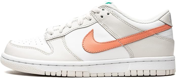 Kids' Nike Dunk Low sneakers, white leather with orange swoosh and lace-up front