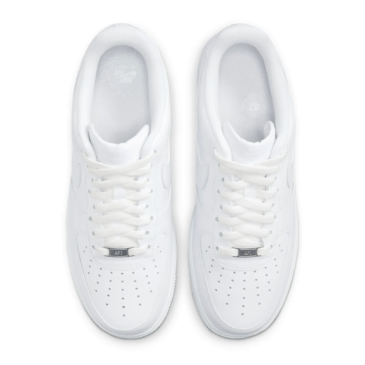 White Nike Air Force 1 lace-up sneakers with perforated toe and cushioned collar