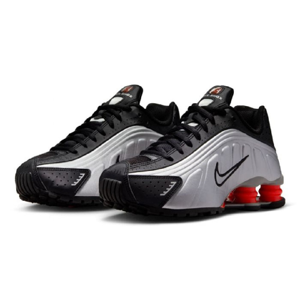 Kids' Nike Shox R4 pair of sneakers, metallic silver sides with black uppers and red pods