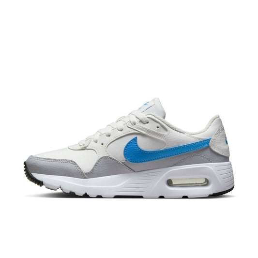 White Nike Air Max SC sneaker with blue swoosh, gray accents, visible Air heel unit