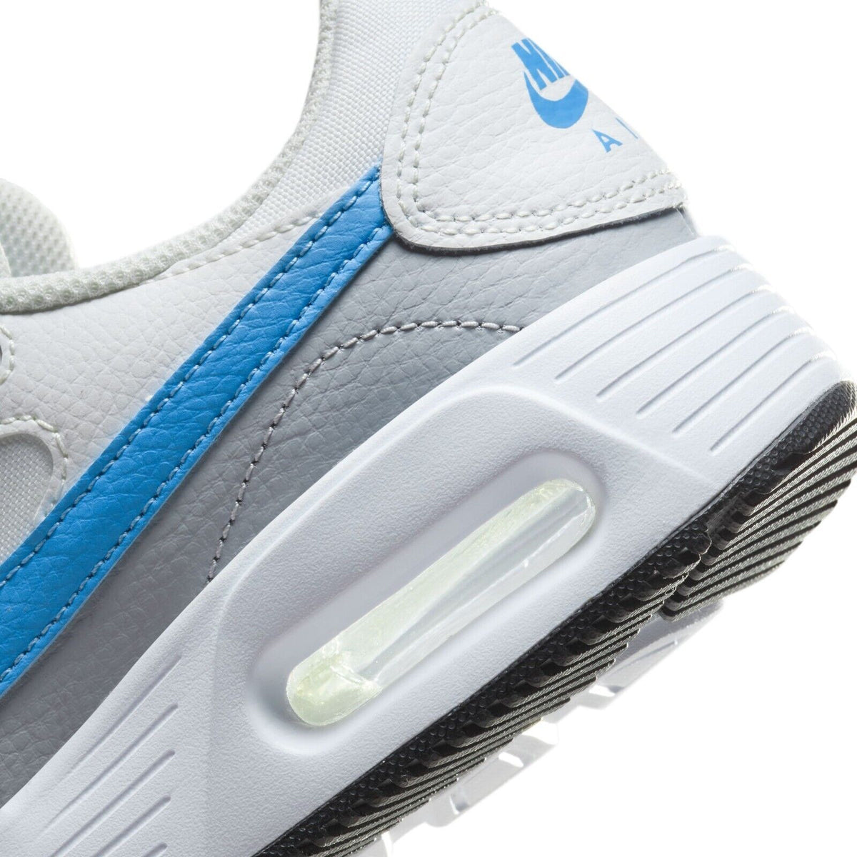 White leather sneaker quarter panel with blue stripe, gray panel, and Air unit window