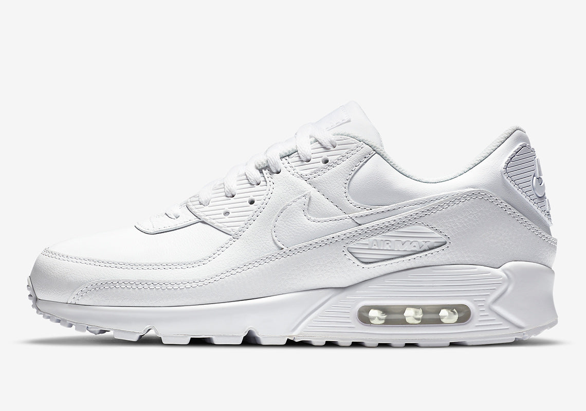 White Nike Air Max 90 LTR low-top sneakers with visible Air cushioning