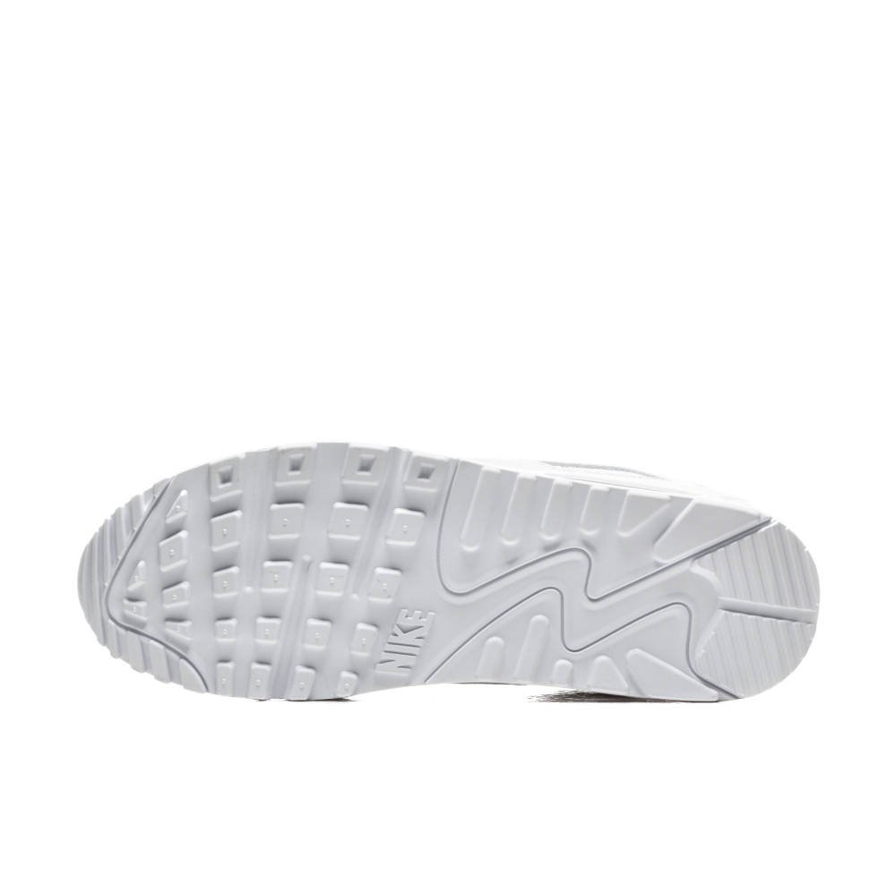 White sneaker outsole with tread pattern and Nike branding