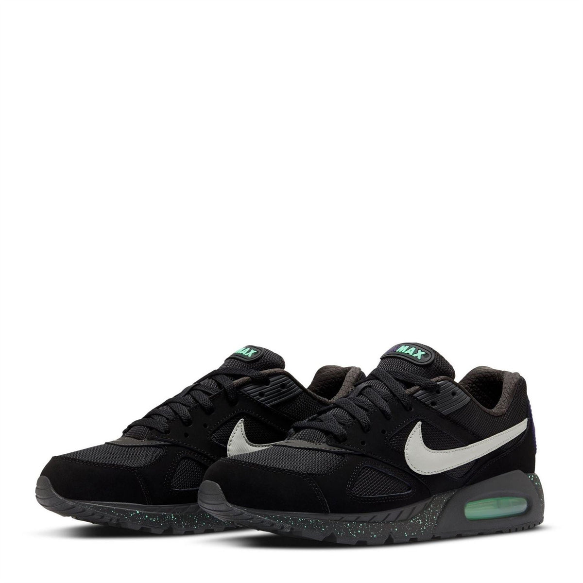 Black Nike Air Max trainers with white swoosh and green air unit, speckled midsole