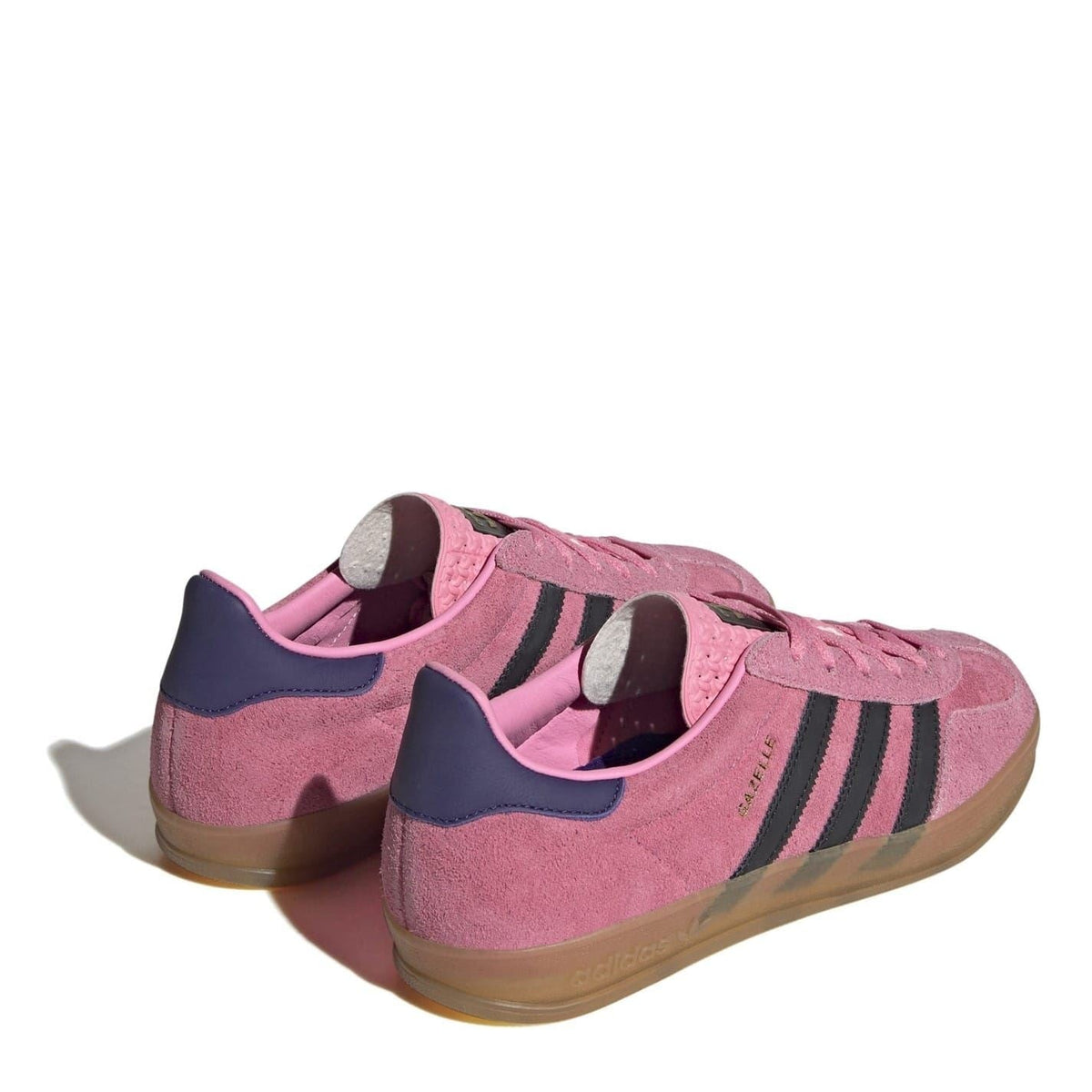 adidas Originals low-top Gazelle trainers, rear view in pink suede with navy heel accents