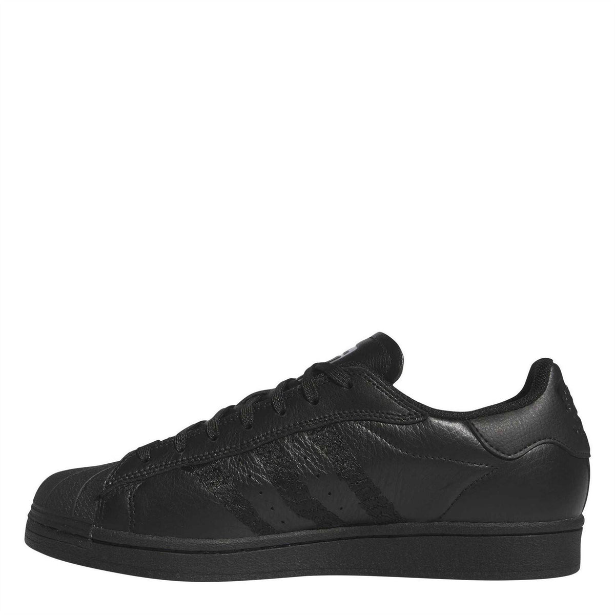 adidas Originals x adidas Superstar ADV trainers featuring classic sneaker design, white leather upper, and rubber sole.