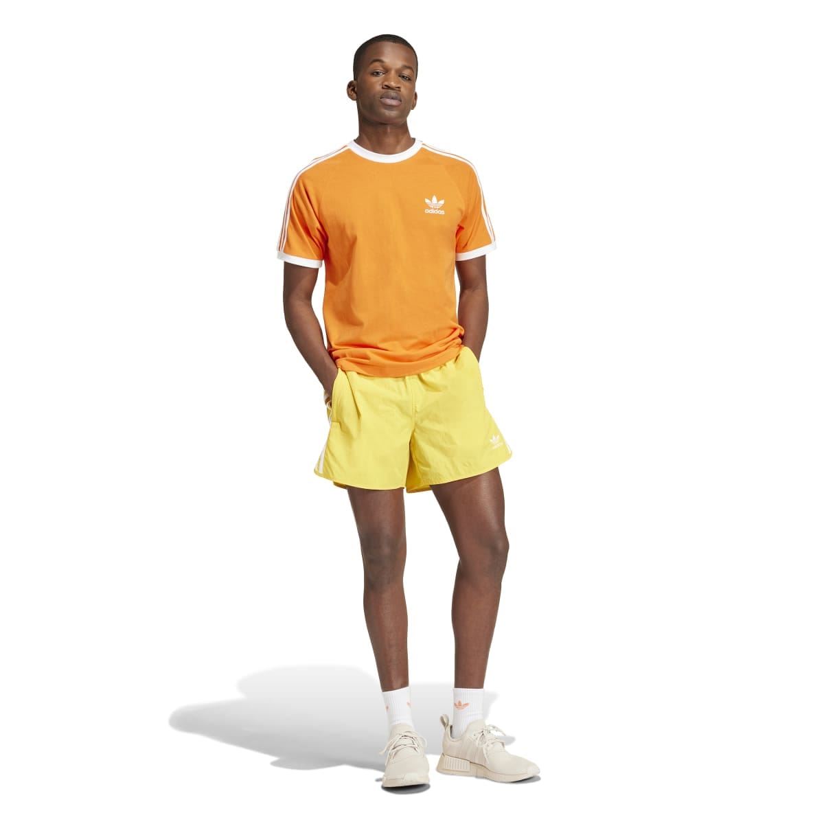 Orange adidas Originals Adicolor T-shirt with white crew neck and chest adidas logo