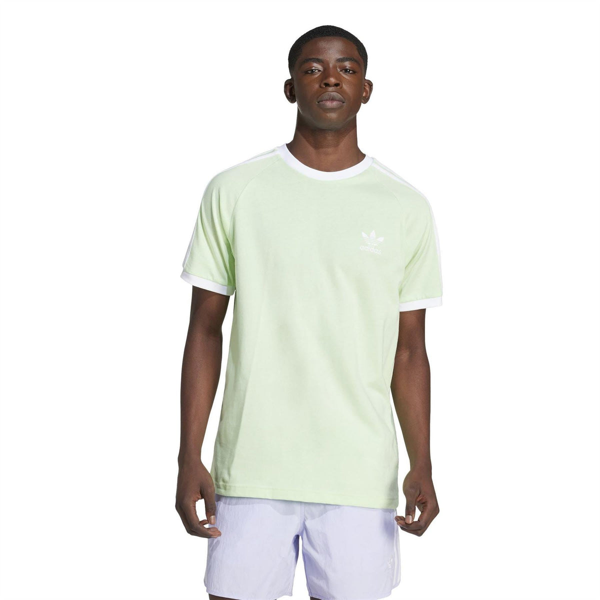 Light green adidas crew neck T-shirt with small chest logo, worn with white 3-Stripes accents