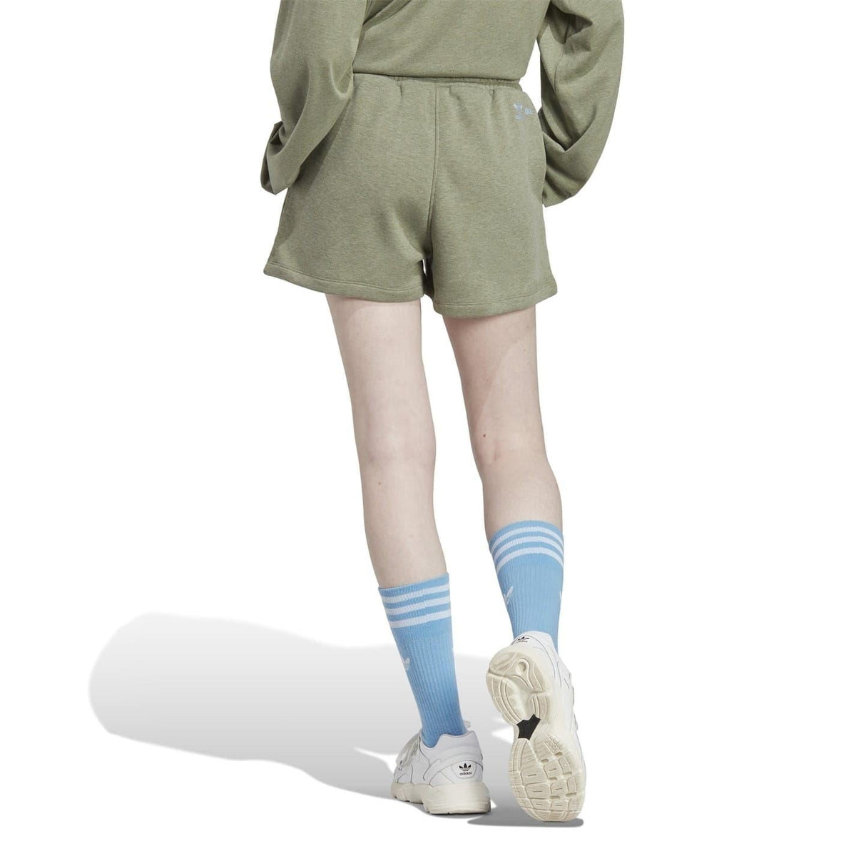 Green sweat shorts with drawstring waist and Moomin graphic, back/side view