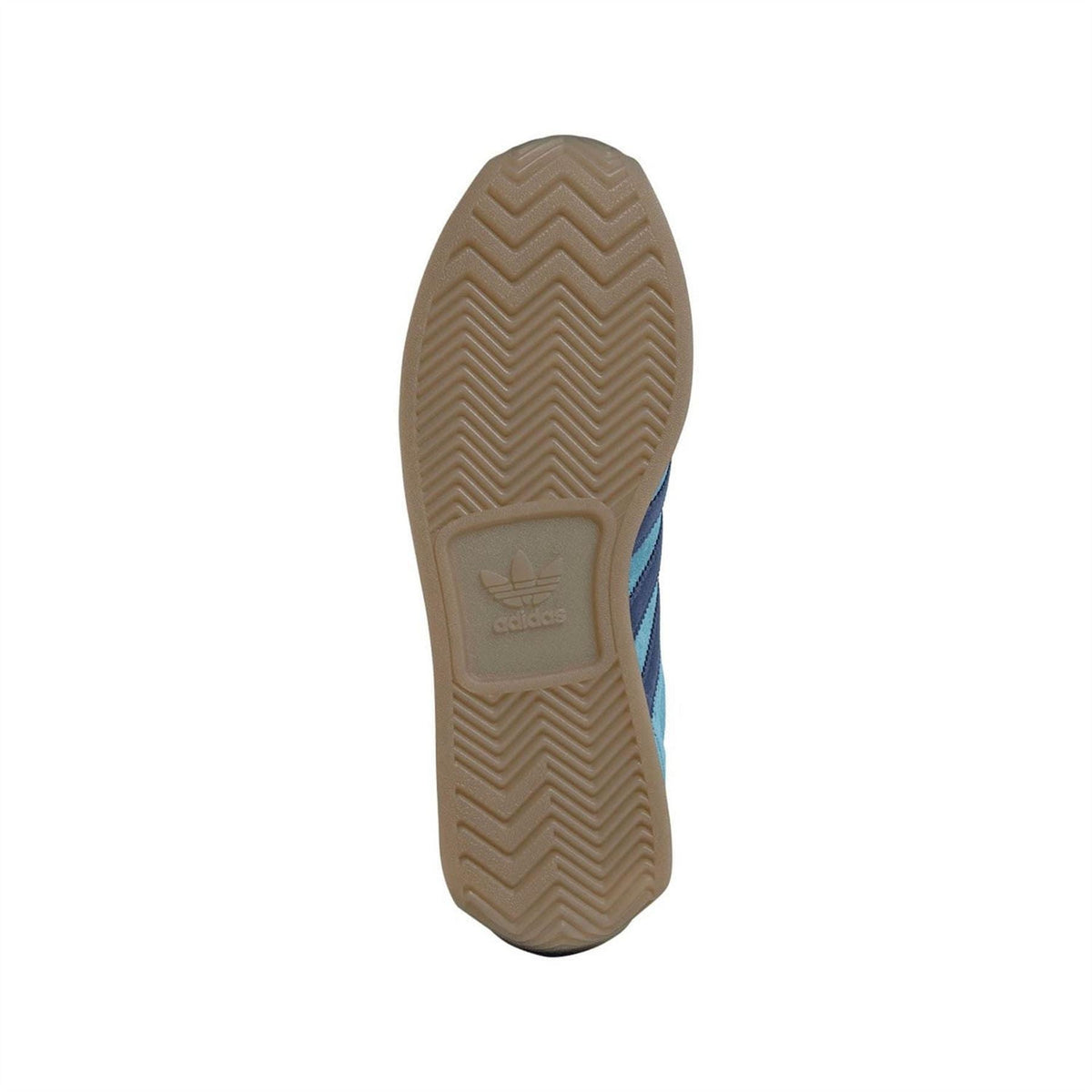 Blue adidas trainers outsole with tan rubber tread pattern