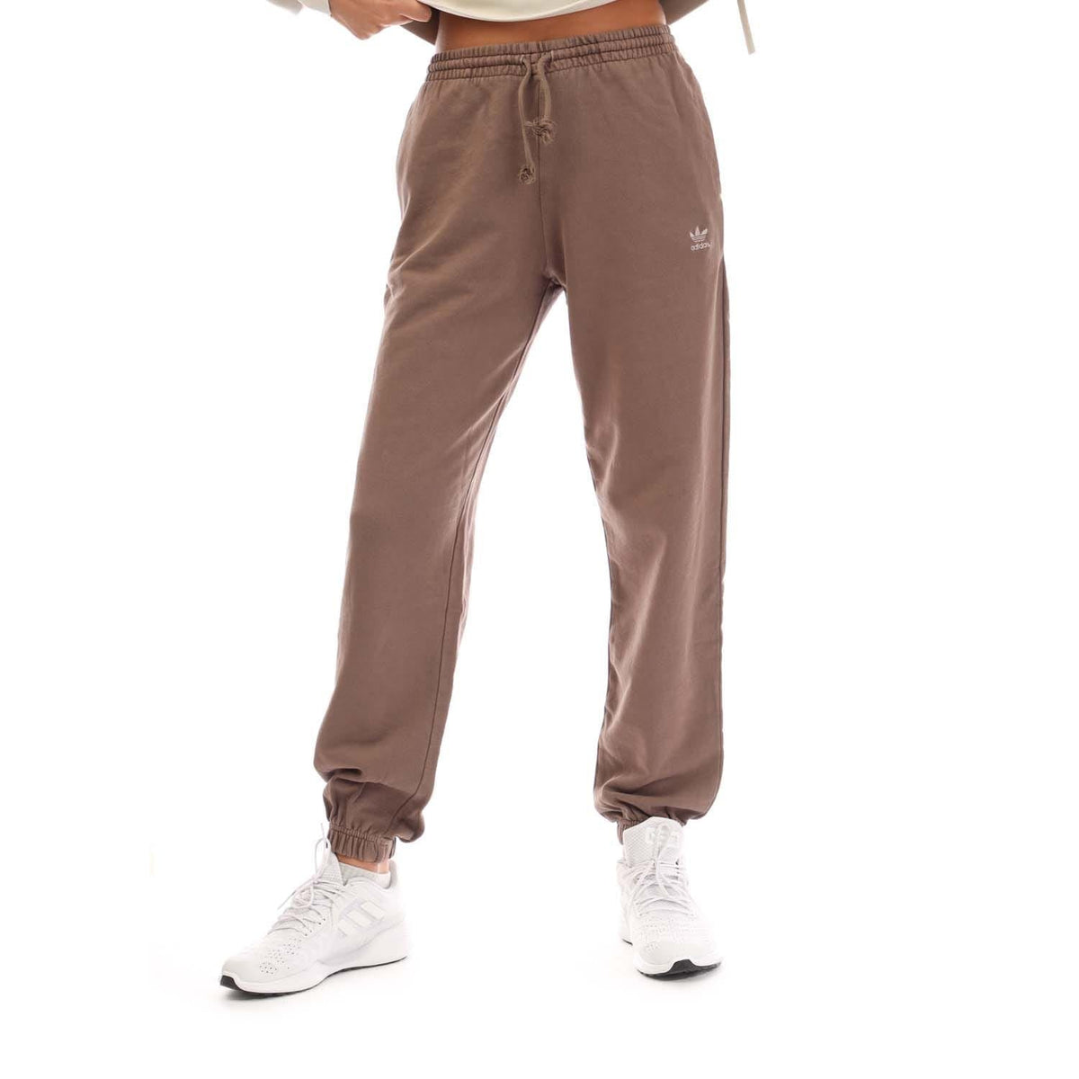 Brown joggers with drawstring waist and ribbed ankle cuffs