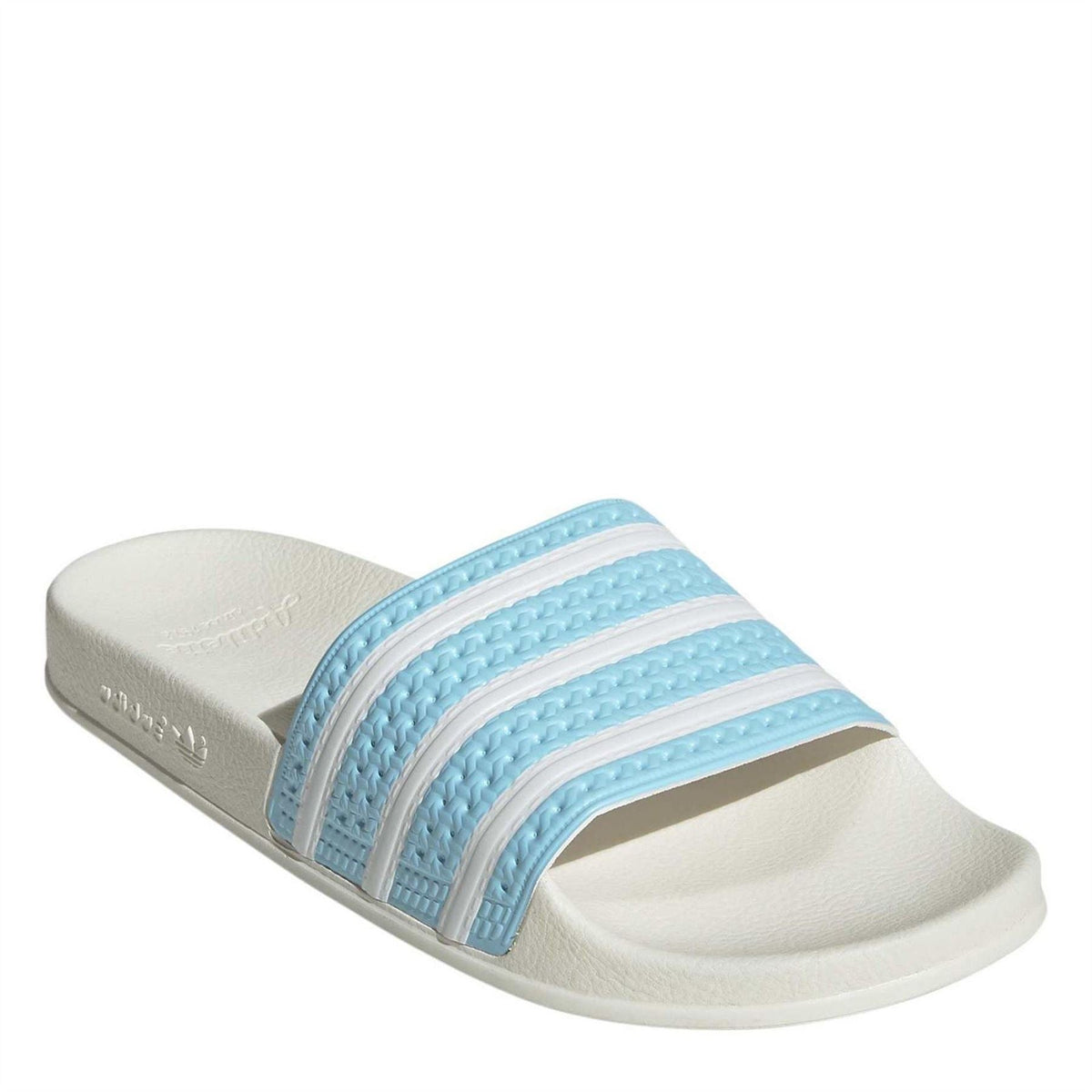 Junior adidas slides, white straps with textured light-blue stripes across foot