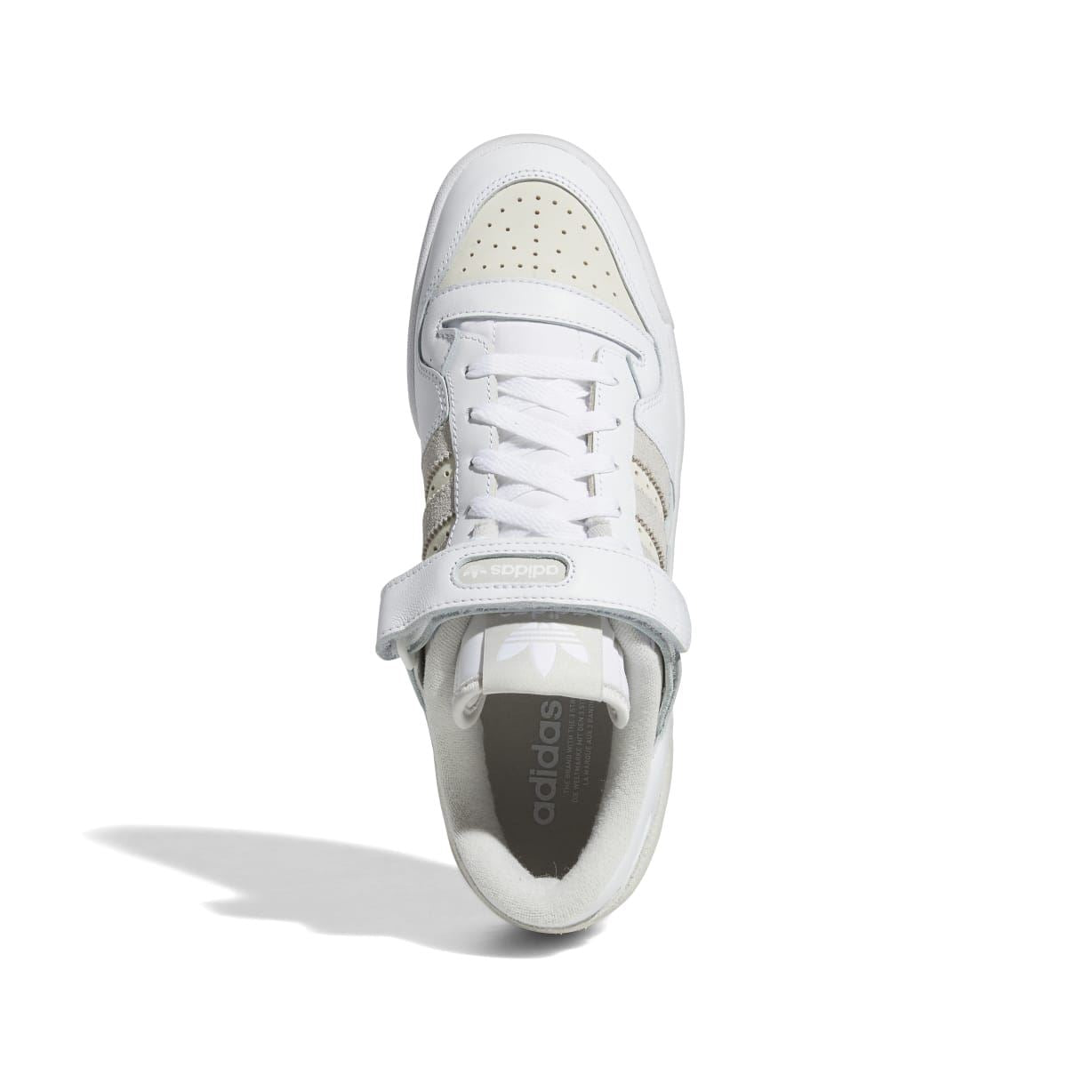 White low-top trainer viewed from above with lace-up front and padded collar