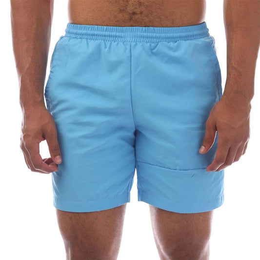 adidas Originals Lock Up swim shorts in navy with white logo, lightweight fabric, and adjustable waistband for comfortable swimming.