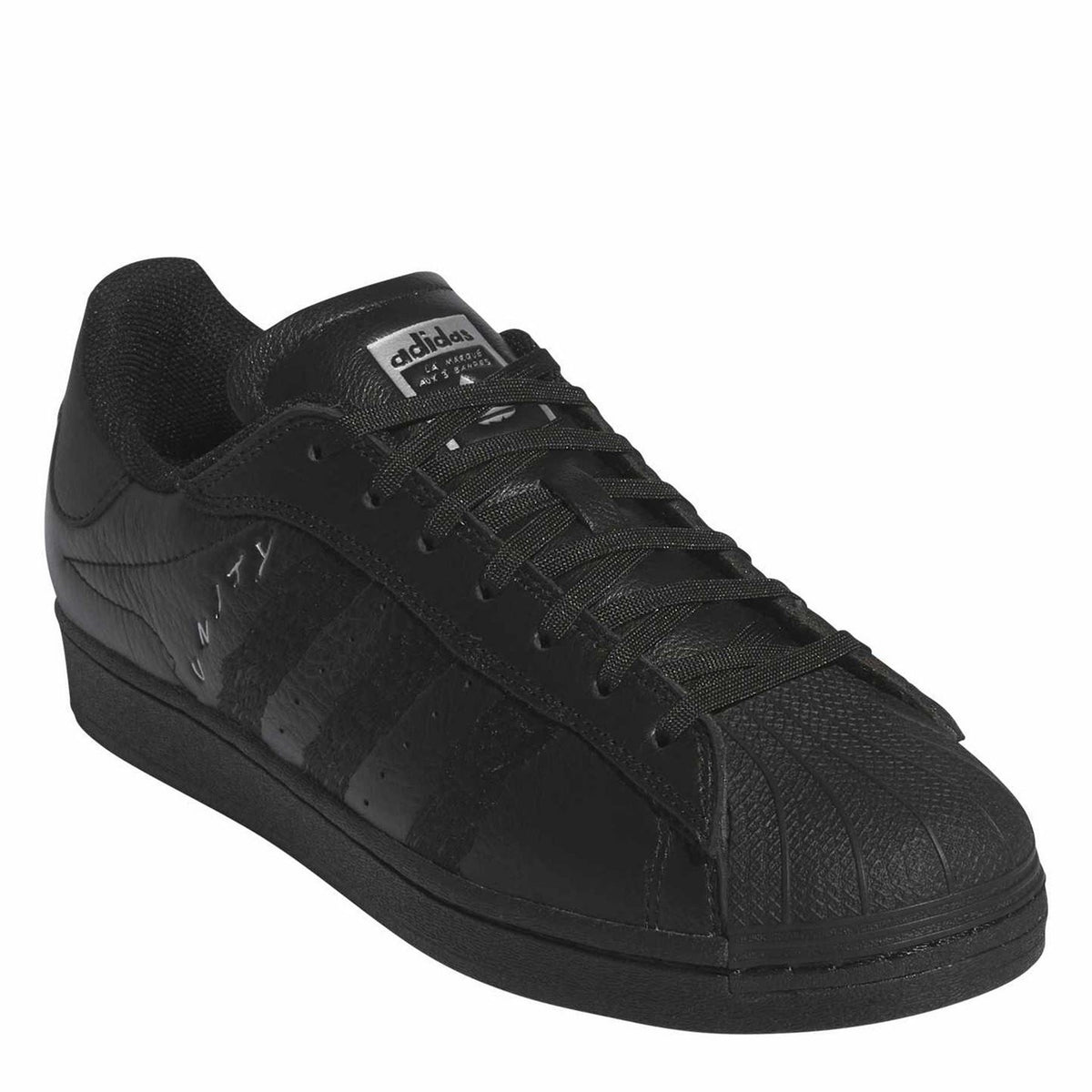 adidas Originals x adidas Superstar ADV trainers, stylish white sneakers with black stripes and classic design, side view.