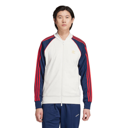 White track jacket with navy sleeves, red stripes, full zip front, mock neck