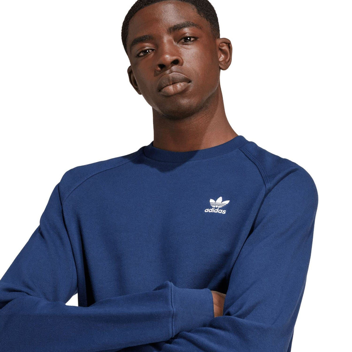 Indigo crewneck sweatshirt with adidas logo and raglan-style shoulder seams