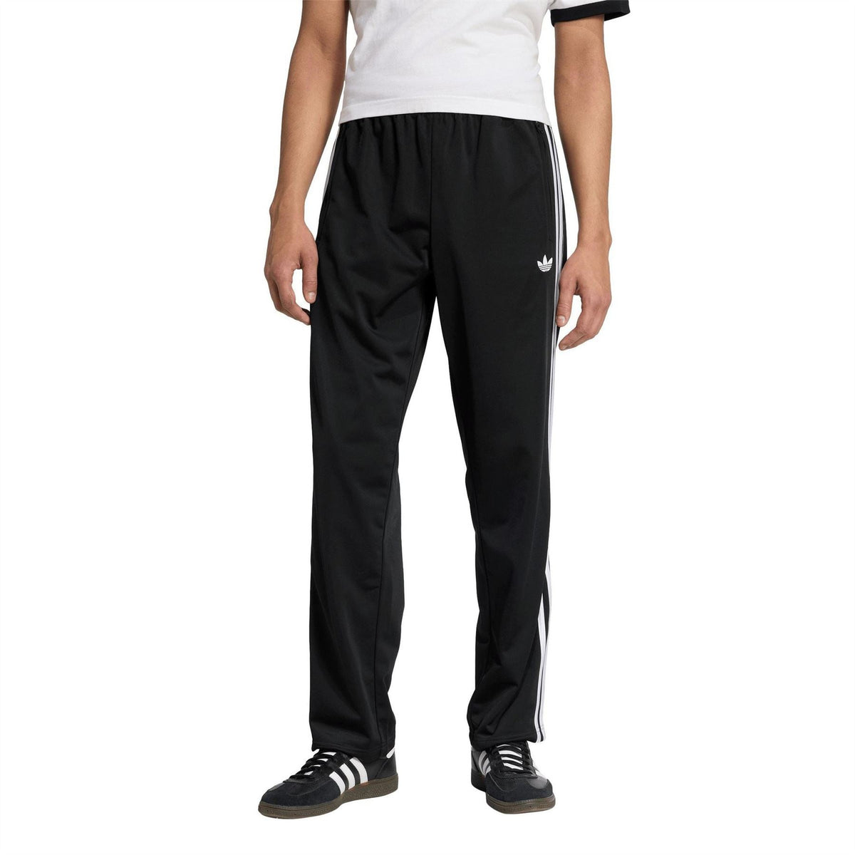 adidas men's woven track joggers in black with elastic waist and white side stripes