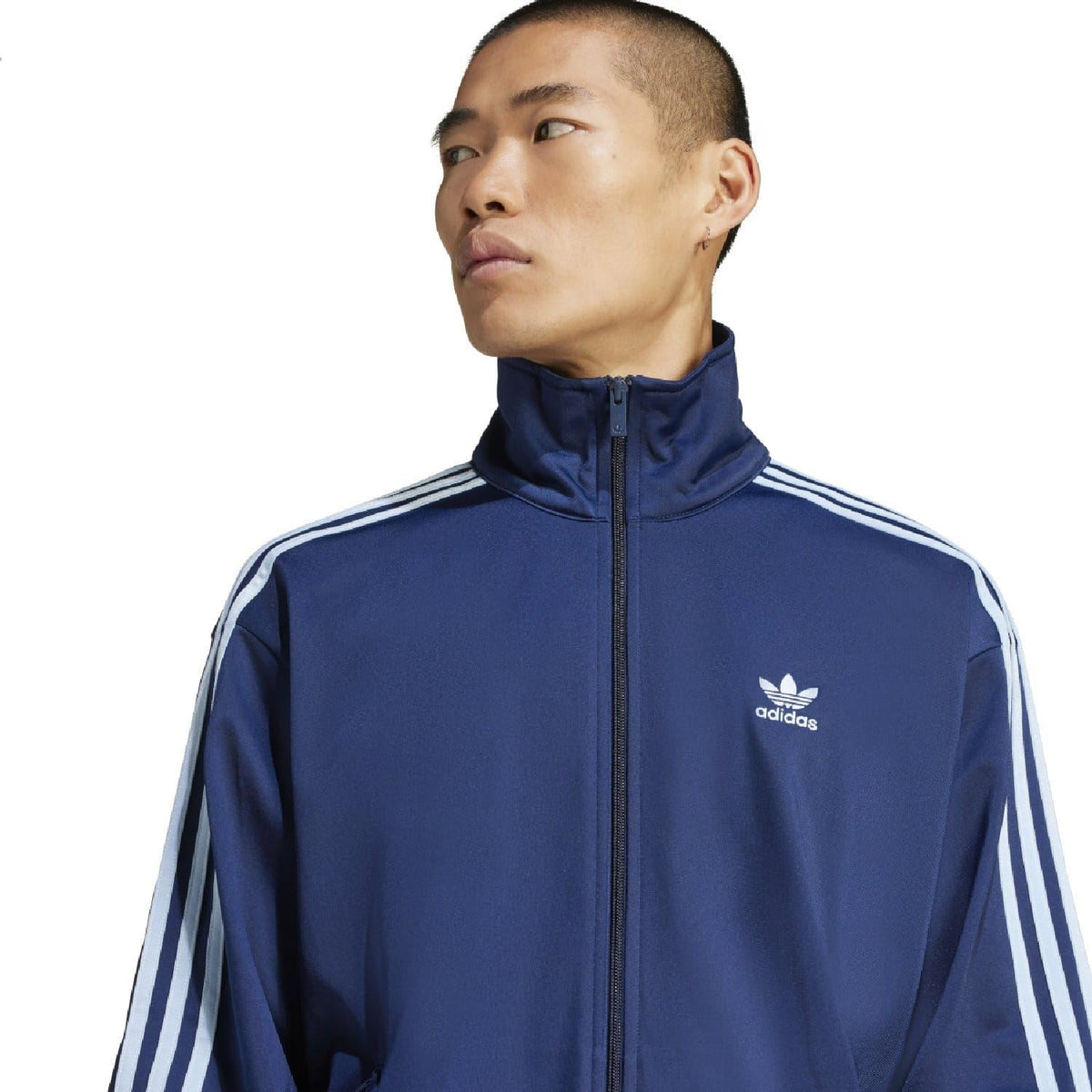 Indigo adidas Originals track top with stand collar, full-zip, and small chest logo