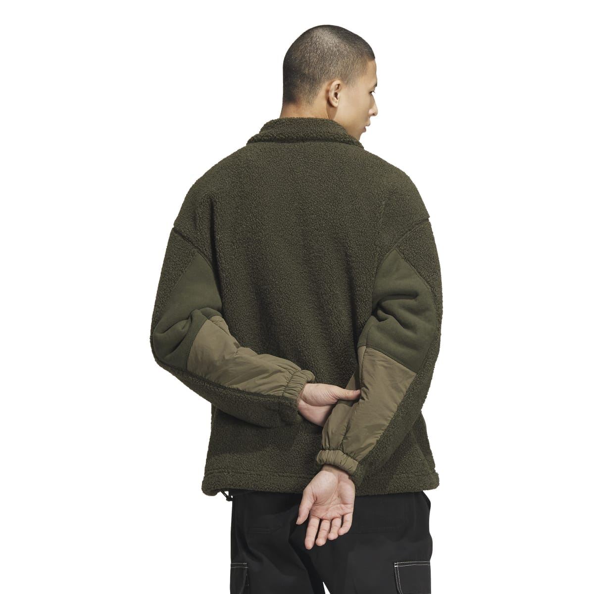 Olive green Sherpa full-zip jacket in profile with rear fleece panel and ribbed cuff detail