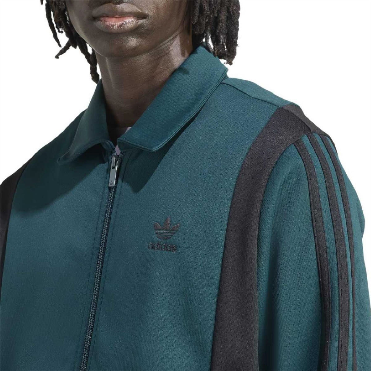 adidas Originals teal track jacket detail with zipper, adidas logo, striped shoulders