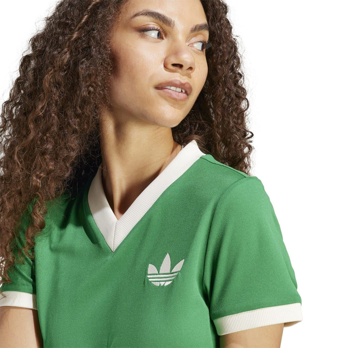 Green V-neck t-shirt with white collar trim and adidas trefoil logo detail on chest