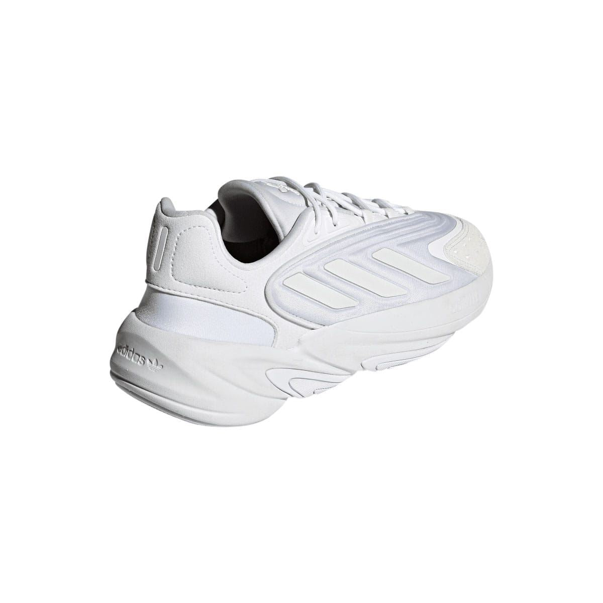 White adidas Ozelia trainers heel view with cushioned collar and chunky sole