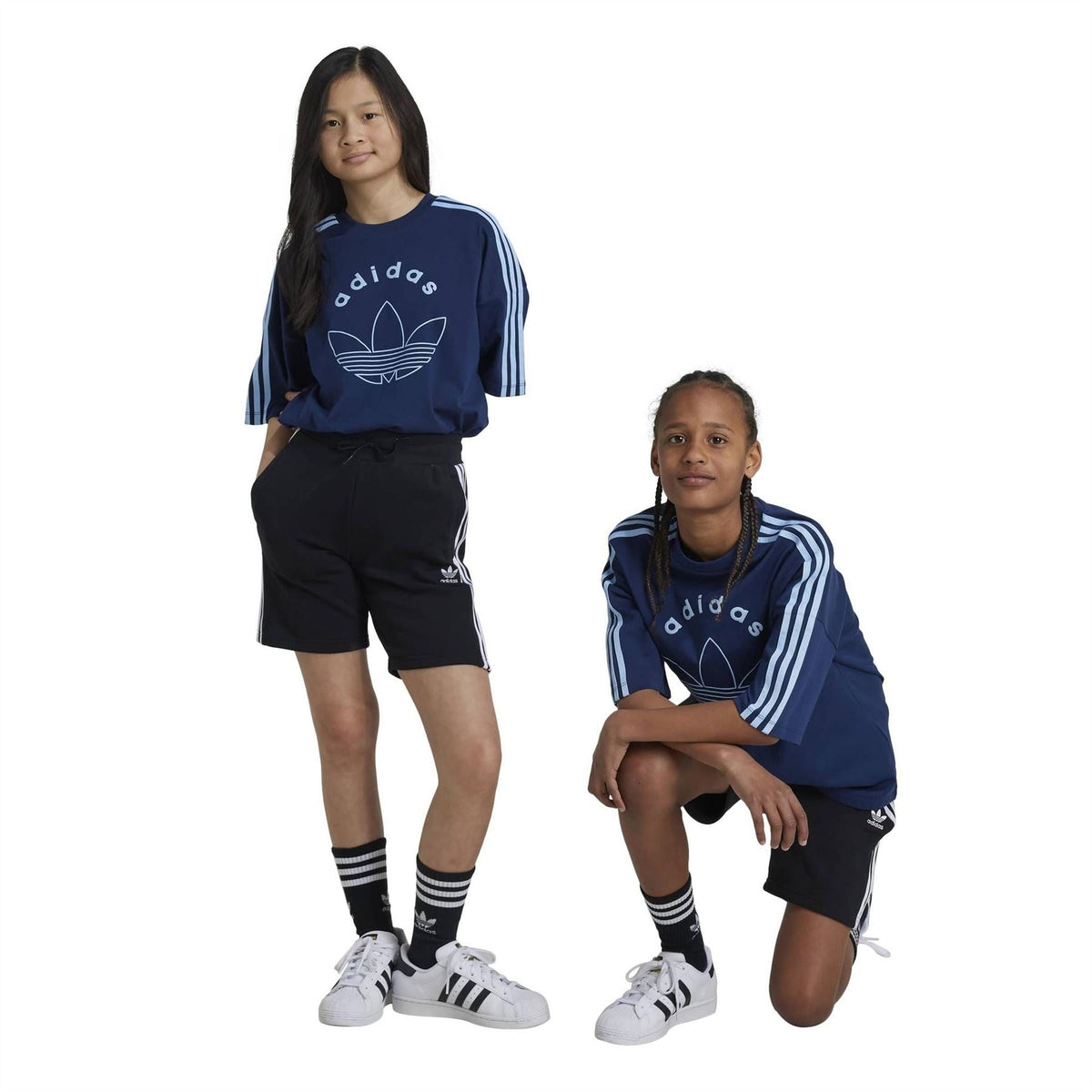 Black adidas sweat shorts with white side stripes and elastic drawstring waistband