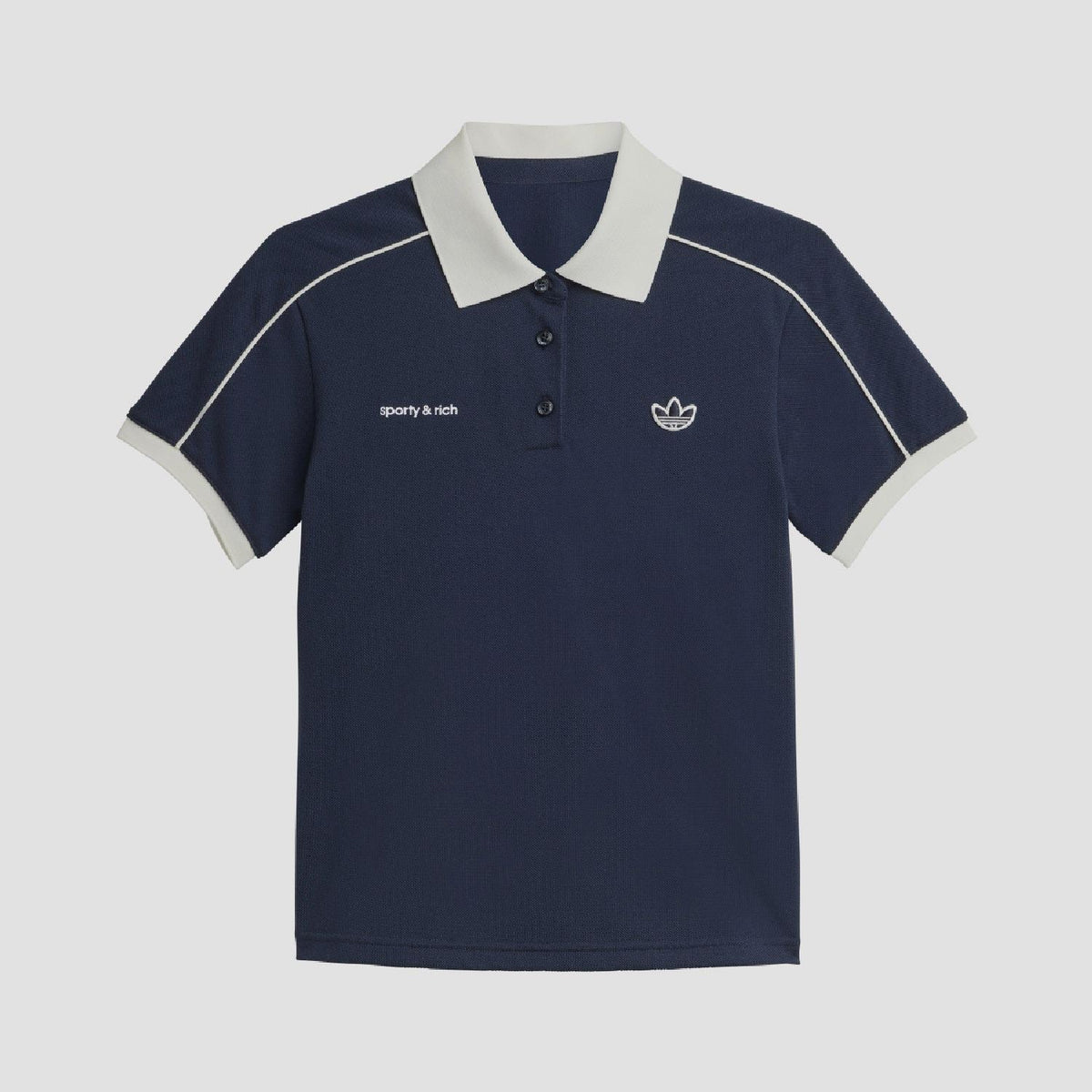 Navy polo shirt with white collar and button placket, sporty & rich chest logo