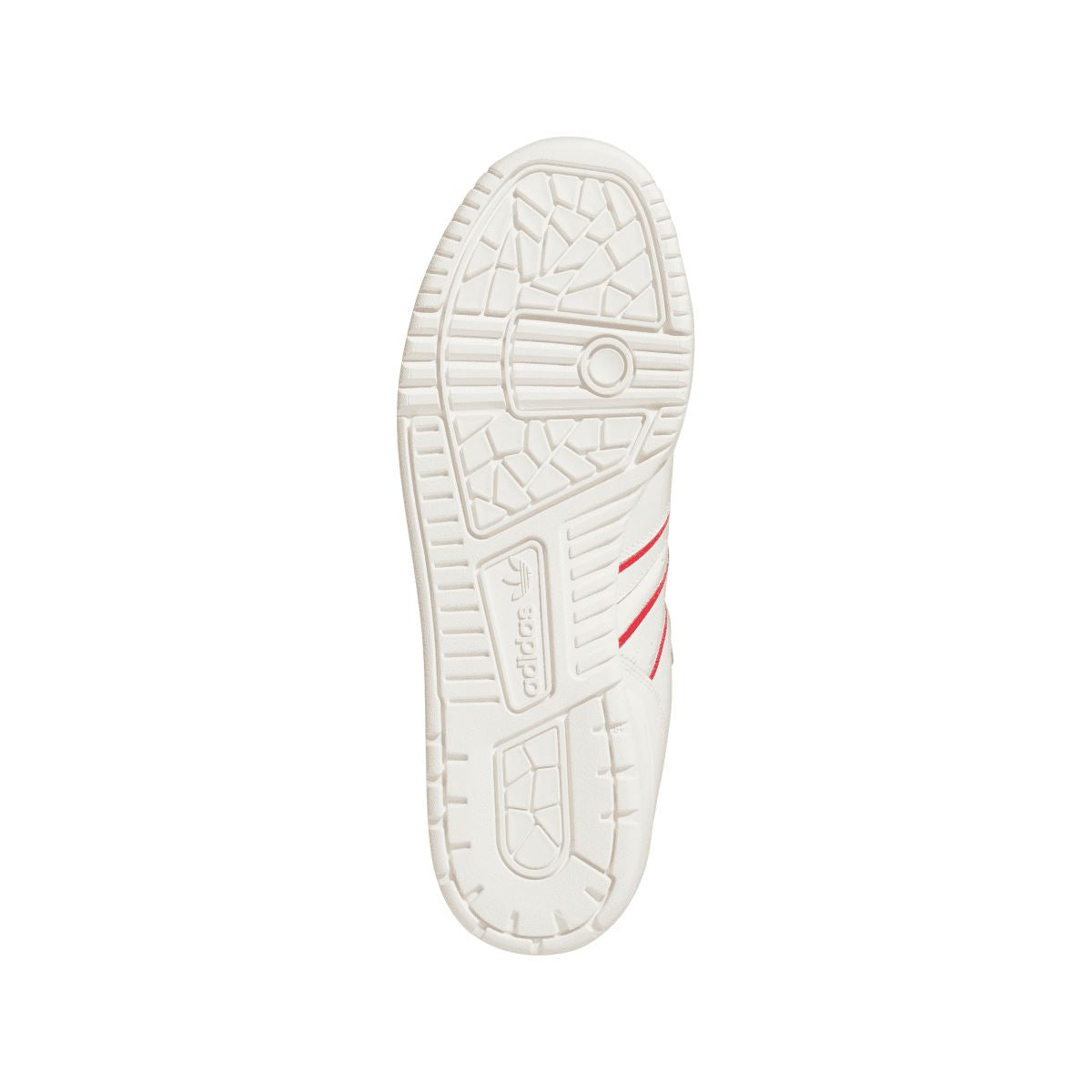 White rubber outsole with tread pattern and circular grip detail.