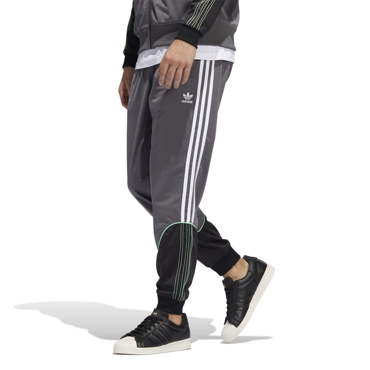 Grey adidas Originals track sweatpants with three side stripes and ribbed cuffs
