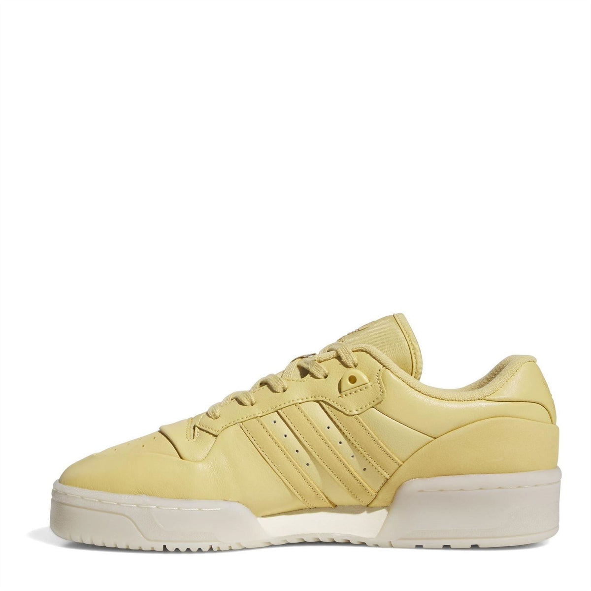 adidas Rivalry low-top flatform sneaker, side view in yellow with lace-up