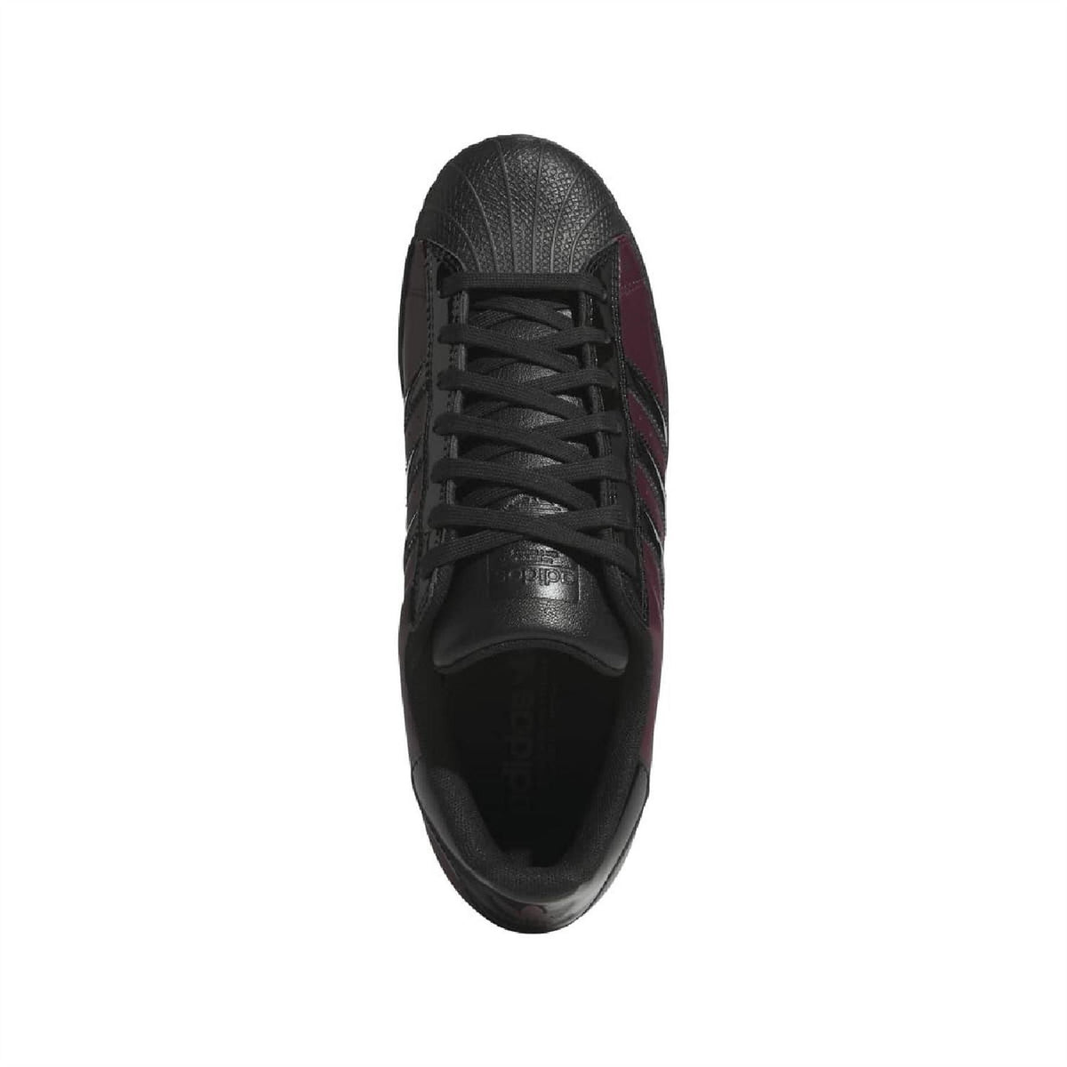 Maroon adidas sneaker with black laces and black textured collar and toe cap