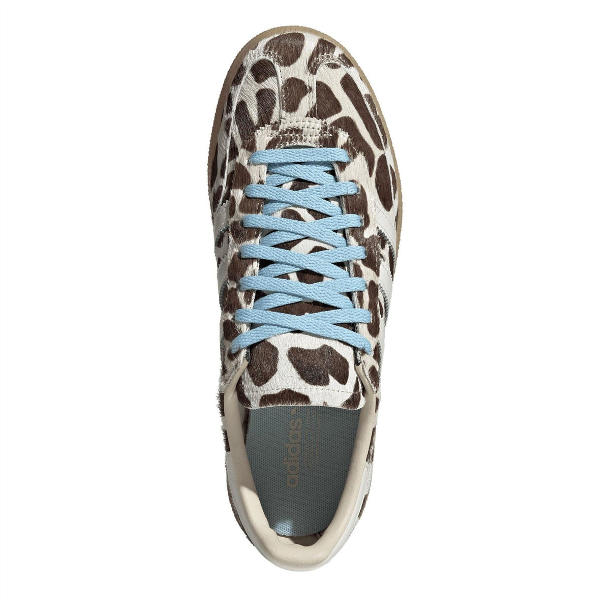 Handball Spezial sneakers, front view, leopard print upper with blue lace-up