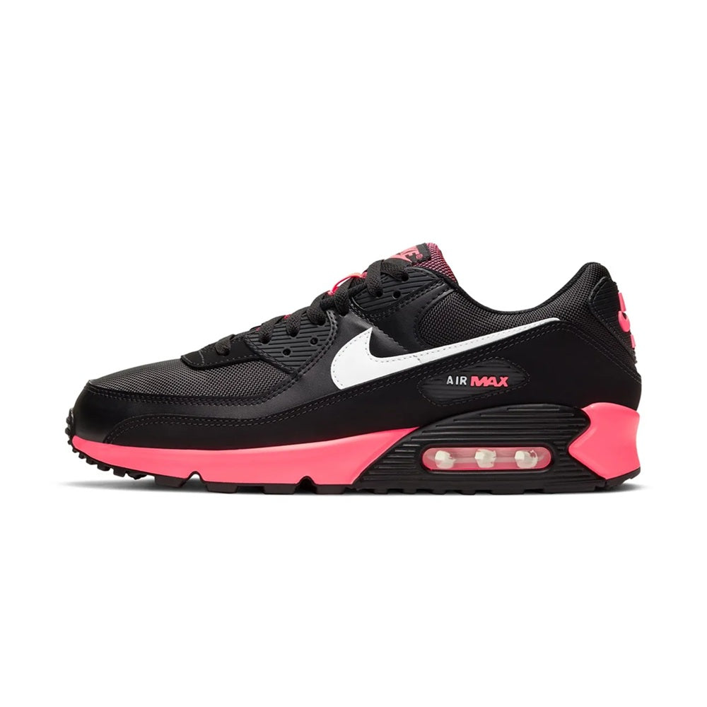 Side view Air Max 90 sneakers in black with white swoosh and racer pink accents