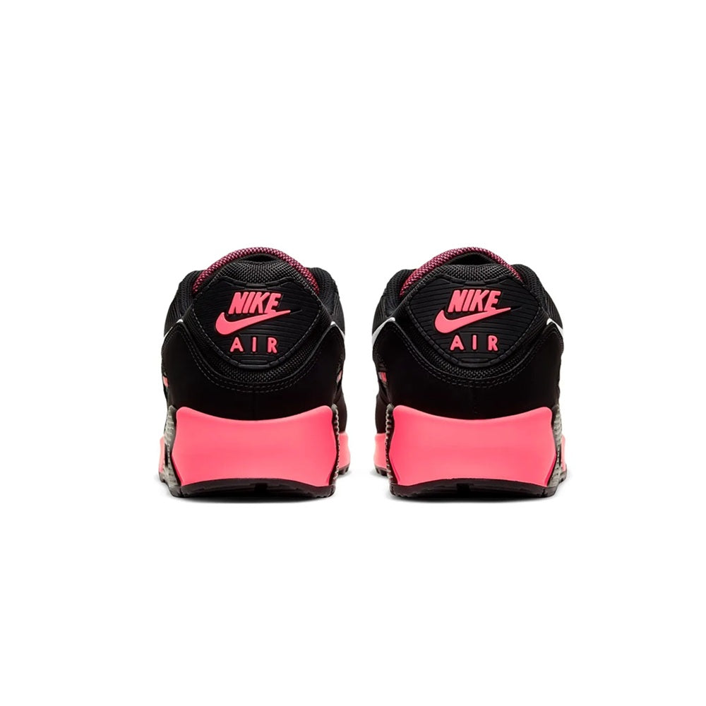 Back view Air Max 90 sneakers: black heels with Nike Air branding and racer pink panels