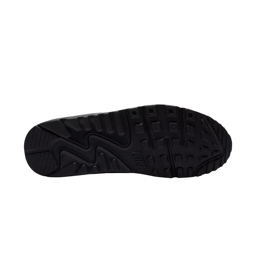 Black rubber outsole with textured tread for traction on Air Max 90 sneakers