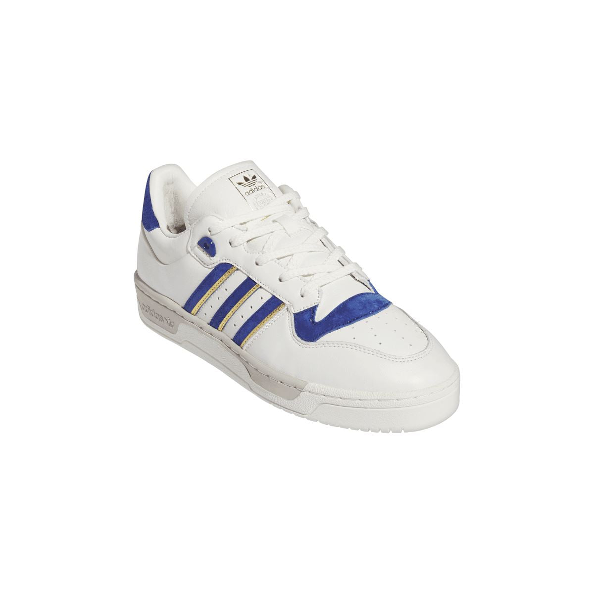 adidas Rivalry 86 low-top trainers, angled side view with white leather and blue stripe accents