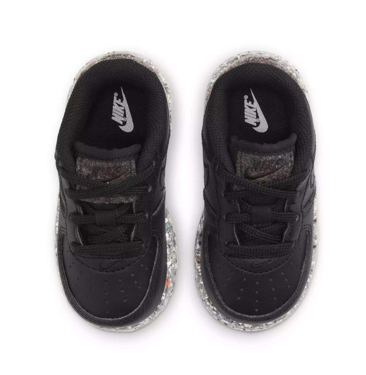 Toddler black sneakers with fabric lining and Nike logo on tongue, lace-up