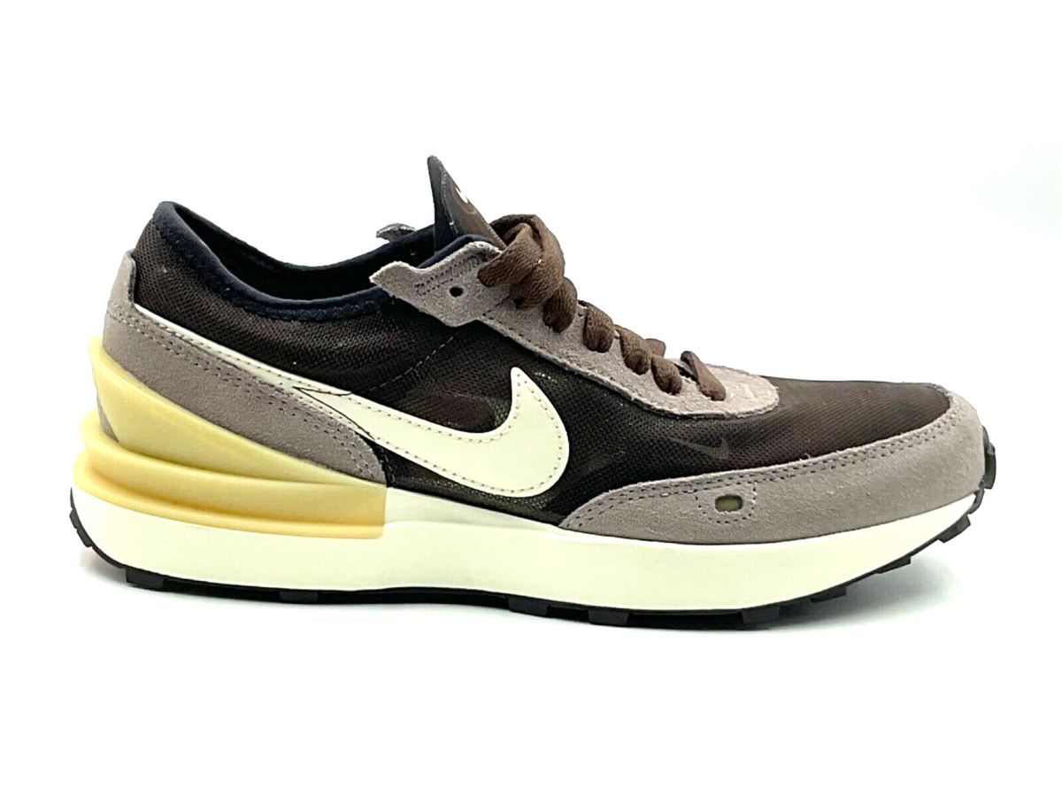 Big Kid's Nike Waffle One sneakers side view, dark brown mesh with white swoosh