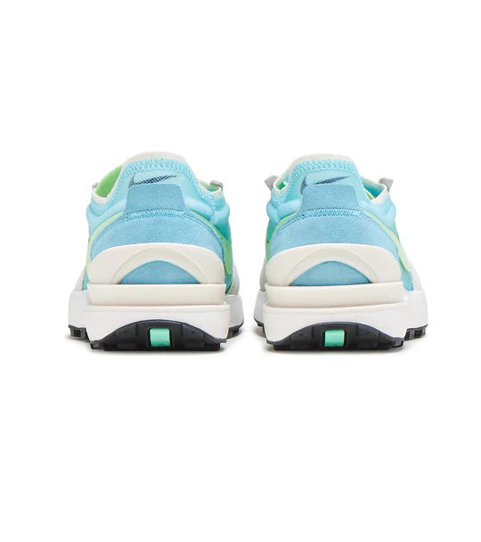 Women's Nike sneakers rear view with aqua heel panels and white foam midsole