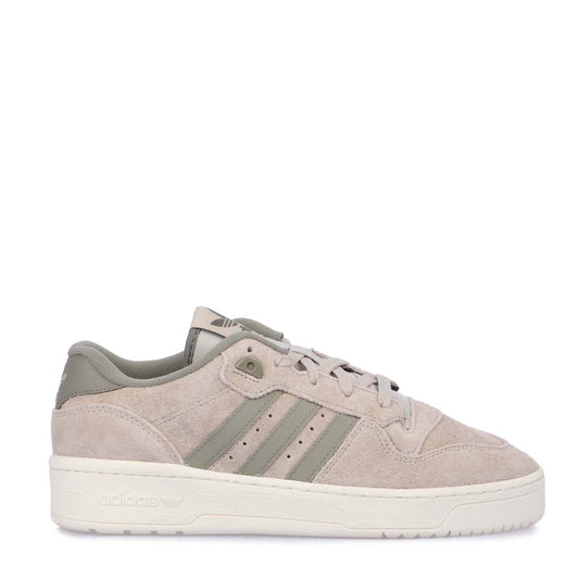 Beige suede low-top trainers with gray-green three stripes and lace-up front
