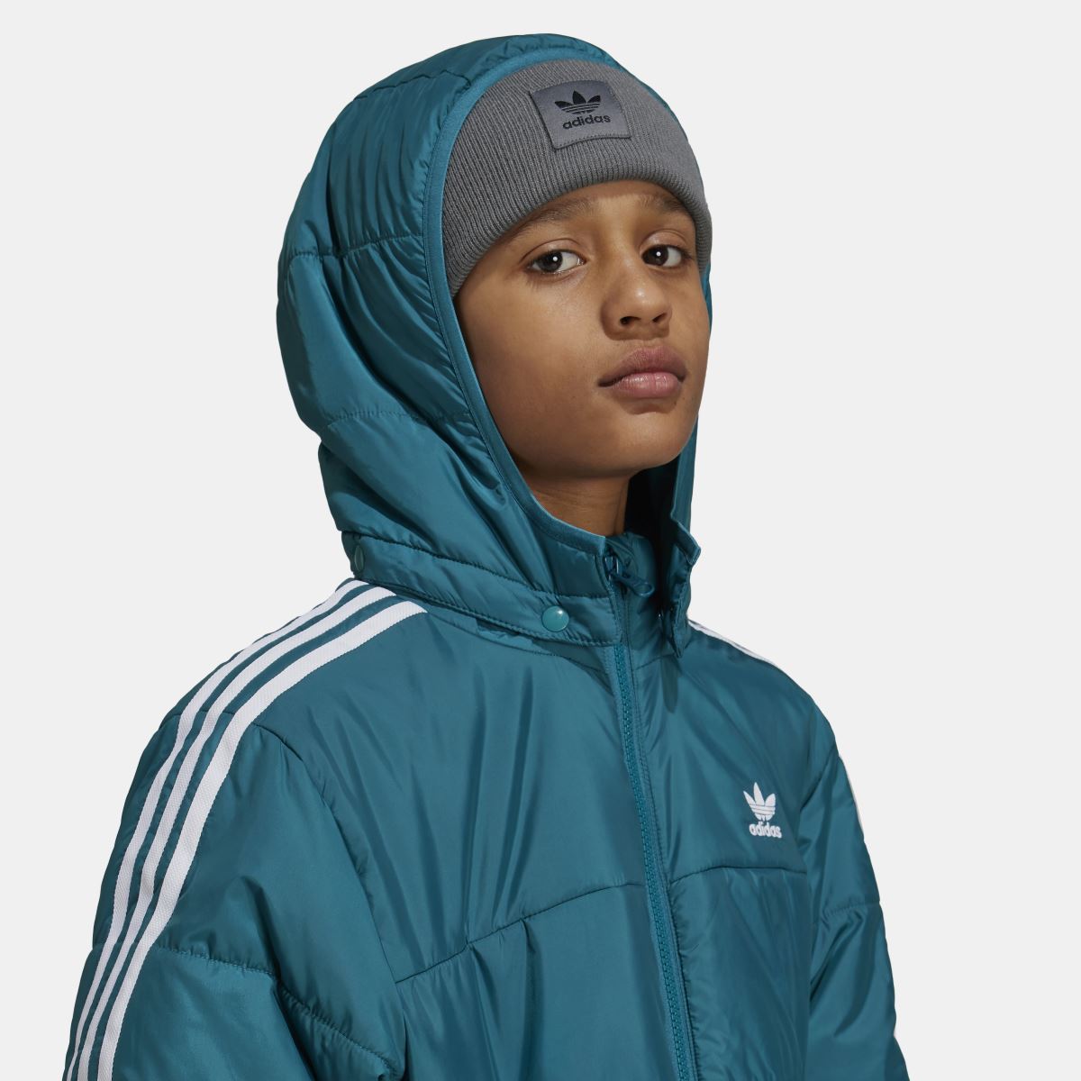 Kids teal adidas padded hooded jacket with face-cover hood and small chest logo