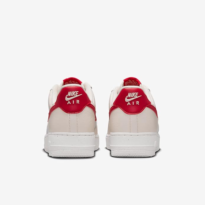 Women's Nike Air Force 1 sneakers, back view with red collar and Nike Air branding