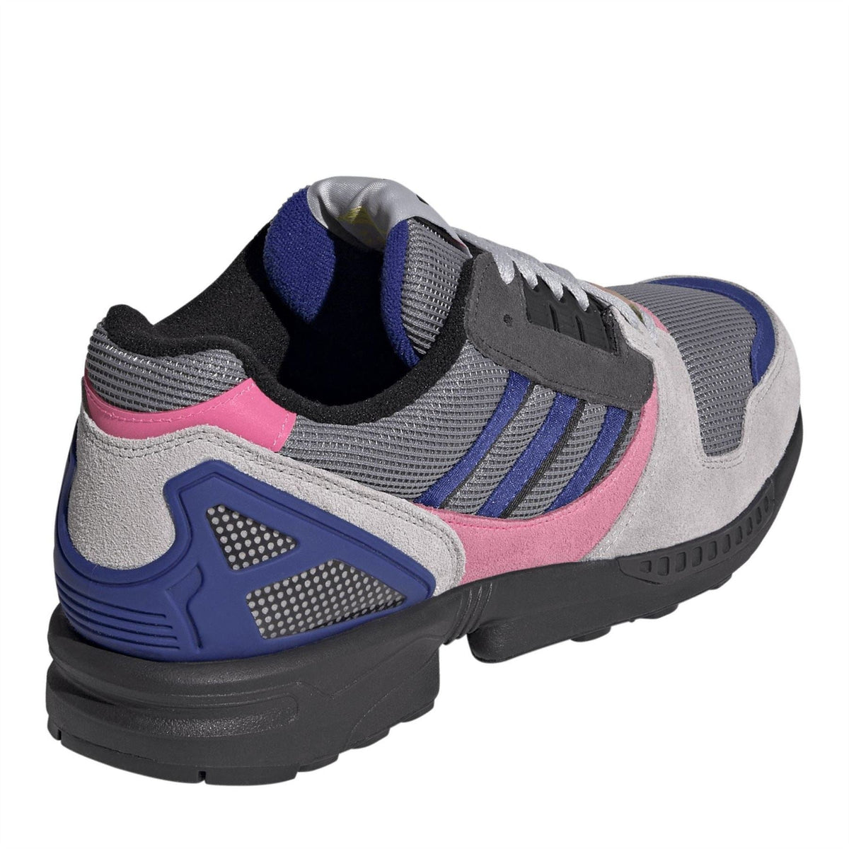 Low-top sneakers with blue heel cage, pink side stripes, grey uppers, black sole