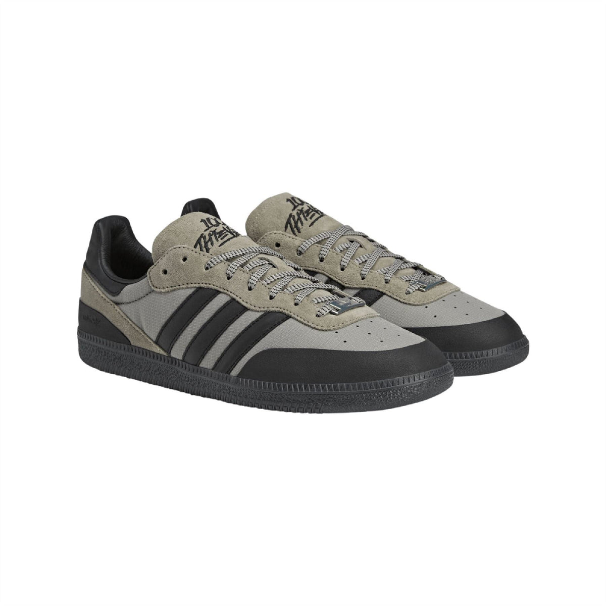 adidas Originals 100 Thieves Palos Hills sneakers showing black and white athletic footwear with stylish design and logo details